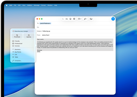 MacBook Air screen showing Apple Intelligence Writing Tools composing an email
